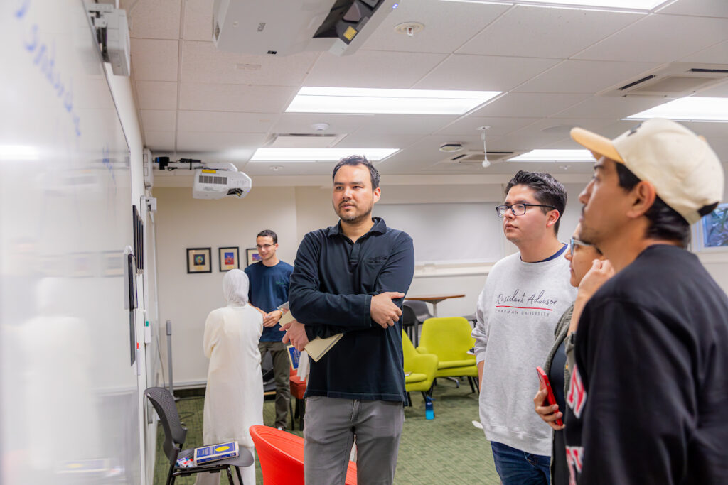 Students looking at a whiteboard