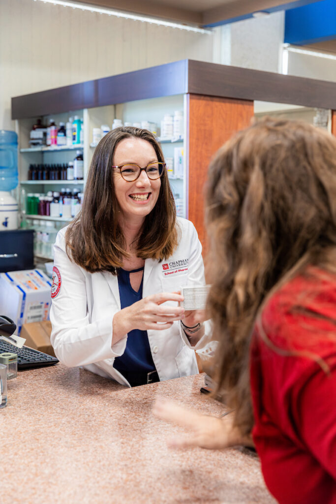 A pharmacy student working at a pharmacy